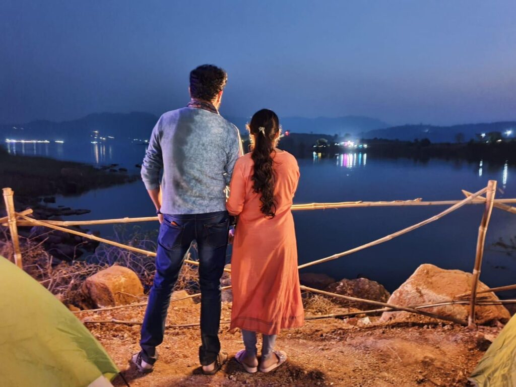 Peaceful lakeside camping near Mumbai with cozy tents