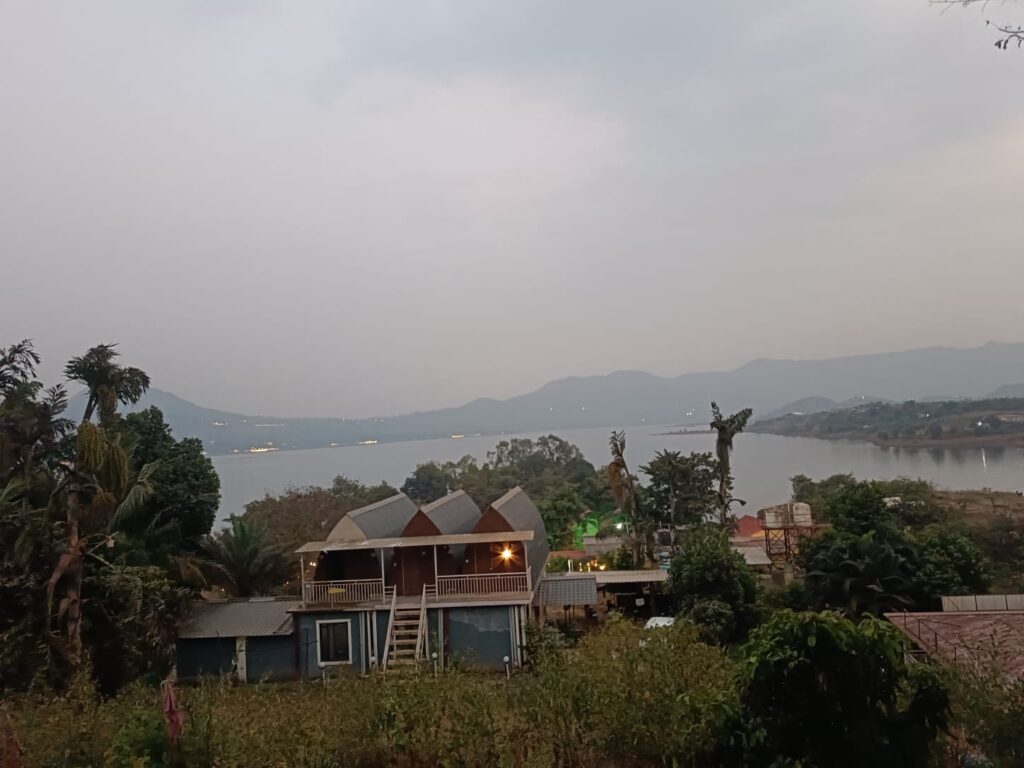 Pawna Lake rainy season start camping tents lakeside view

