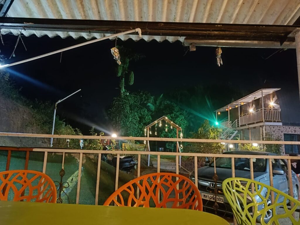 Couple enjoying February camping at Pawna Lake